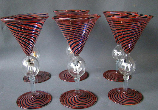 Set of six Venetian wine stems, swirl design with blown center having animal figures in center, 7 inches x 4 inches. Estimate: $300-$600. T A C Estate Auctions Inc. image.