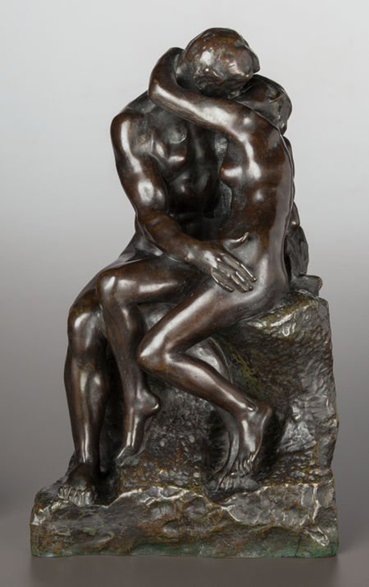 Auguste Rodin (French, 1840-1917) ‘Le Baiser, 3ème réduction,’ designed in 1886, the reduced version conceived in 1901, and this cast executed between 1905 and 1910, bronze with brown patina, 15 3/4 x 9 3/4 x 10-1/2 inches. Estimate: $250,000-$350,000. Heritage Auctions image.