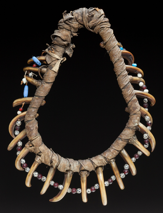 Prairie grizzly bear claw necklace, circa 1835, composed of 22 grizzly bear claws, interspersed with globular glass beads, 15 inches. Estimate: $20,000-$30,000. Heritage Auctions image.