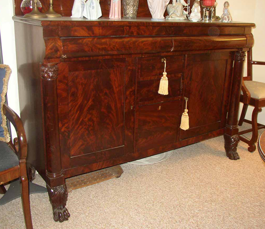 This sideboard had a severe sag in the middle. It sat in my shop for over five years with a small jack under the front edge. It took that much time for it to straighten out.