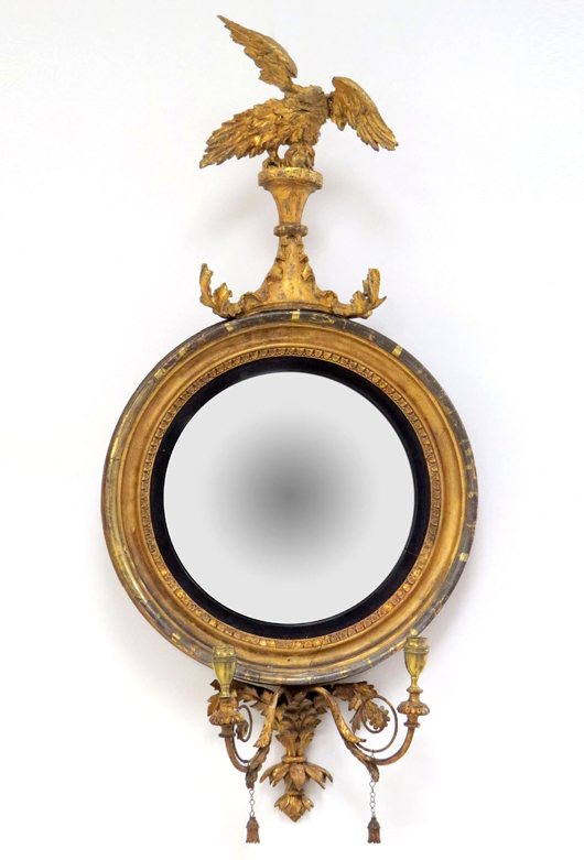 Federal carved and gilt framed girandole mirror. William Jenack Estate Appraisers and Auctioneers image. 