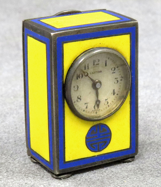 Vintage Cartier miniature travel clock. William Jenack Estate Appraisers and Auctioneers image.