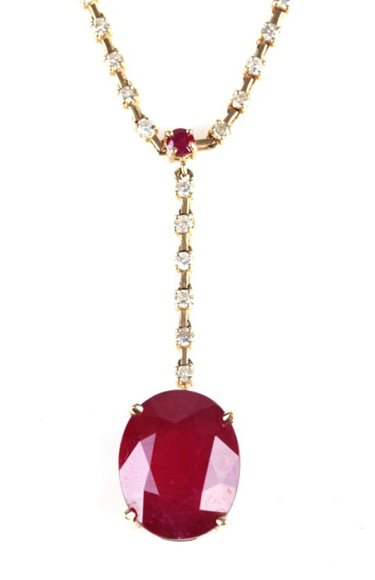 Lot 134: 16.41-carat ruby, 14K yellow gold and diamond necklace. Gray’s Auctioneers image.