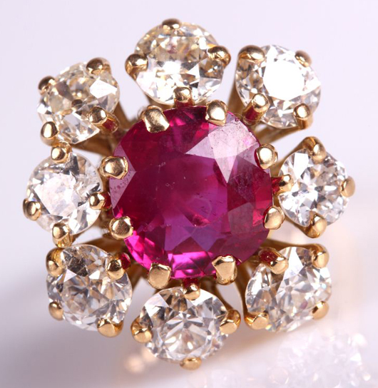 Lot 9: 18K yellow gold, ruby and diamond ring. Gray’s Auctioneers image.
