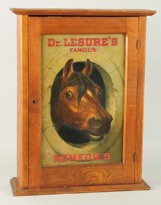 Dr. Lesure’s Famous Remedies veterinary cabinet, oak with tin front, est. $3,000-$6,000. Morphy Auctions image.