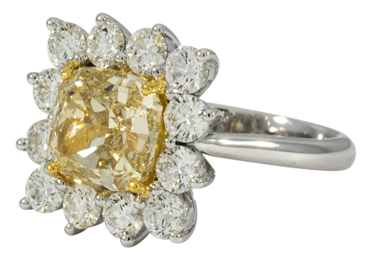 This stunning ring that featured a fancy brownish yellow diamond surrounded by near colorless diamonds topped the jewelry offerings, selling for $28,560. Clars Auction Gallery image.
