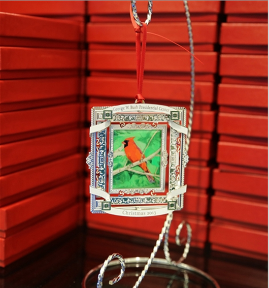 2013 Christmas ornament incorporating the image of a painting by former President George W. Bush. Image courtesy of the George W. Bush Presidential Center.