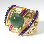 Amethyst, ruby and emerald cabochons make a colorful statement on this large Lola Demner bangle that Moran’s is offering for $6,000-$8,000. John Moran Auctioneers image.