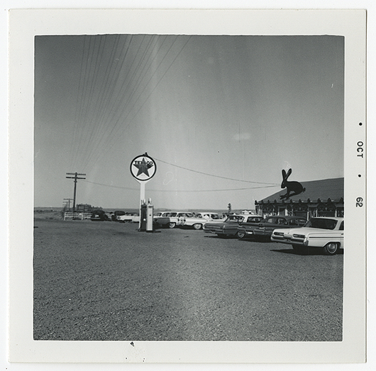 Snapshot of Texaco Jackrabbit station in Kingman, Ariz., related to Ed Ruscha's first artist book 'Twentysix Gasoline Stations,' which was published in 1963. Image courtesy of the Harry Ransom Center. 