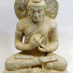 Gandharan grey schist figure of seated Buddha, 2nd/3rd century. Estimate £2,500-£3,000. Image courtesy of Roseberys.