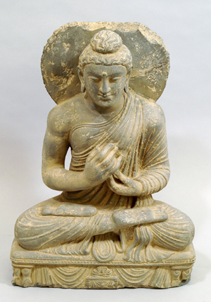 Gandharan grey schist figure of seated Buddha, 2nd/3rd century. Estimate £2,500-£3,000. Image courtesy of Roseberys.