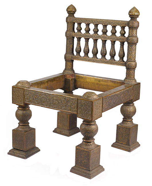 The strange legs and fence-like back on this chair are copied from Indian designs. A pair of these chairs sold in September for $242,500 at a Bonhams auction in New York. They were created by Lockwood de Forest, who also was known for his paintings and other designs.