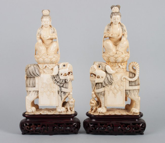 Chinese ivory mounted Quan-Yin pair. Alex Cooper Auctioneers Inc. image.