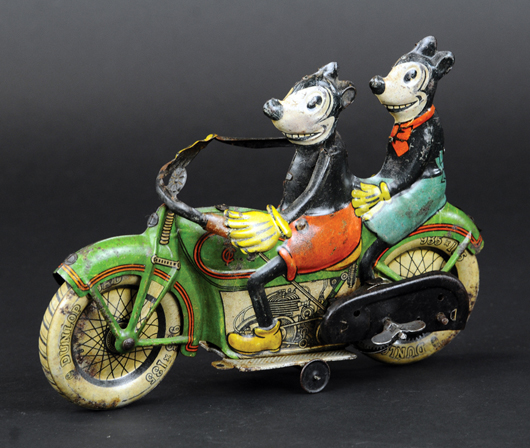 Tipp & Co. Mickey and Minnie Mouse on a clockwork motorcycle. Sold for $56,050. Bertoia Auctions image.