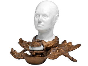 This 19th-century American inkwell is topped by a 6-inch milk glass phrenology head. The head is marked with the 'organs' that were once thought to indicate a person's character. The inkwell was offered for $1,500 at a fall 2013 Cowan's auction in Cincinnati.