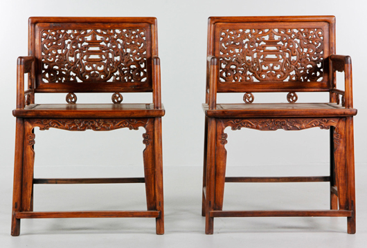 Pair of Huanghuali carved wood chairs. Price realized: $15,600. Kaminski Auction image.
