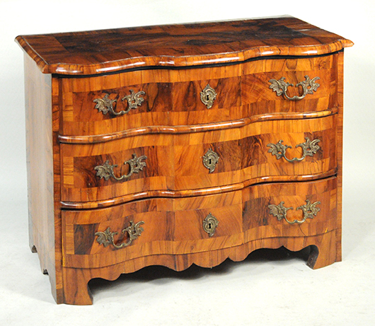 German walnut serpentine commode serpentine commode. Price realized: $3,300. Woodbury Auction image.