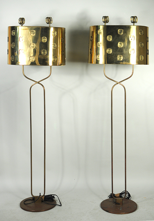 Finnish brass floor lamps, Paavo Tynell. Price realized: $58,800. Woodbury Auction image.