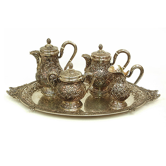 Indo-Persian .900 silver tea and coffee service. Stephenson's Auctioneers image.
