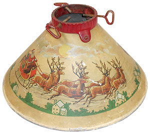 This Noma Christmas-tree stand was made in the late 1920s or 1930s. The base is 14 1/2 inches in diameter. The stand is made of lithographed tin and pictures Santa's sleigh and reindeer. It sold for $270 at a November 2013 Rich Penn auction in Iowa.