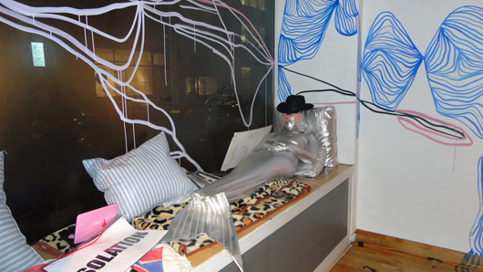 A Surrealist slumbering silver mermaid greeted guests to the Mayor Gallery’s Christmas party. Image Auction Central News.