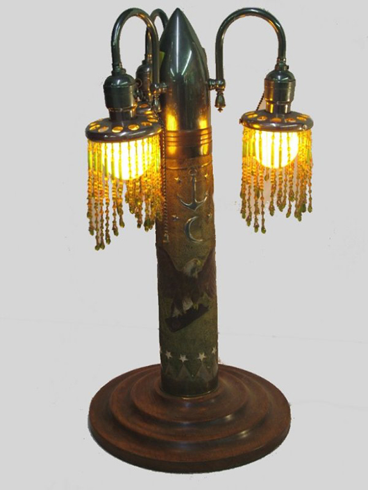 This table lamp made from an artillery shell is a fine example of trench art. Image courtesy of LiveAuctioneers.com Archive and North River Auction Gallery.