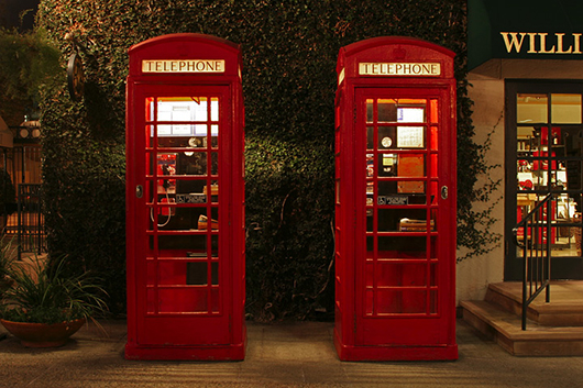 Similar vintage phone booths in London. Image courtesy of Aaron Logan. This file is licensed under the Creative Commons Attribution 2.5 Generic license.