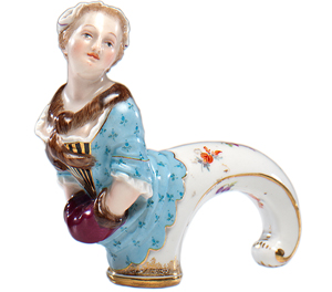 This porcelain cane handle must have been used carefully to remain unbroken for over 100 years. The woman figure was made by the Meissen porcelain factory of Germany. It sold for $800 at an October 2013 Cowan's auction in Cincinnati.