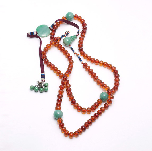 Amber and glass court necklace. Price realized: $29,500. Michaan’s Auctions image.
