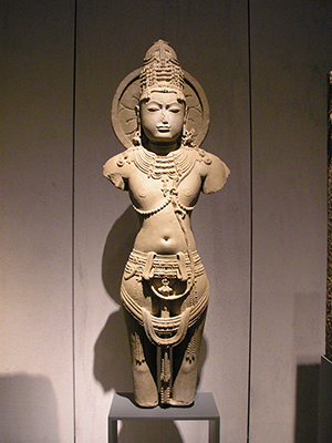 This 11th century yellow sandstone statue of the deity Rajasthan is in the collection of the Museum fur Indische Kunst, Berlin-Dahlem. May 2006 photo by Gryffindor.