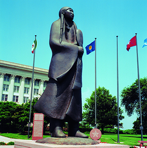 Allan Houser (U.S., 1914-1994), 'As Long as the Waters Flow,' dedicated June 4, 1989, bronze, 162in x 76in x 76in. Located at the Oklahoma State Capitol South Plaza. Commissioned by the State Capitol Preservation Commission.
