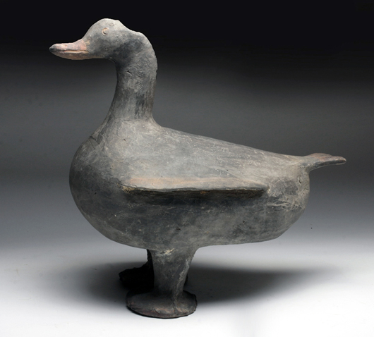 Lot 64: Chinese Han Dynasty duck effigy, circa 206 B.C.-A.D. 220. Estimate: $5,000-$6,000. ArtemisGalleryLIVE image.