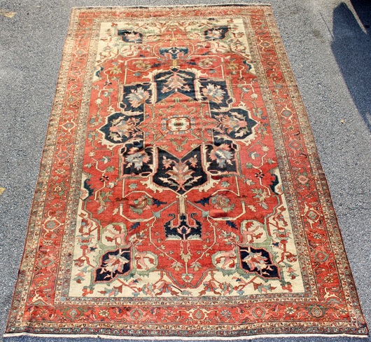 Antique hand-woven serapi rug, made circa 1900, about 9 feet by 14 feet. Price realized: $15,000. Ahlers & Ogletree image.