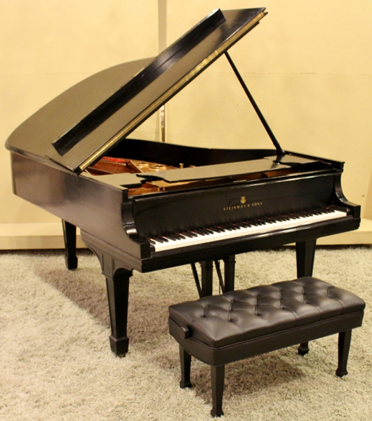 Steinway & Sons 1921 Music Room Model A baby grand piano in satinwood case. Price realized: $12,000. Ahlers & Ogletree image.