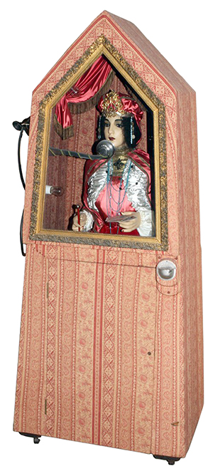 Esmeralda, the vintage fortune-0teller, will nod, turn her head, move her jaws and hands and even blink. An Esmeralda machine was offered at two different 2013 auctions, but she did not attract a high enough bid to sell. Photo courtesy of DuMouchelles, Detroit.