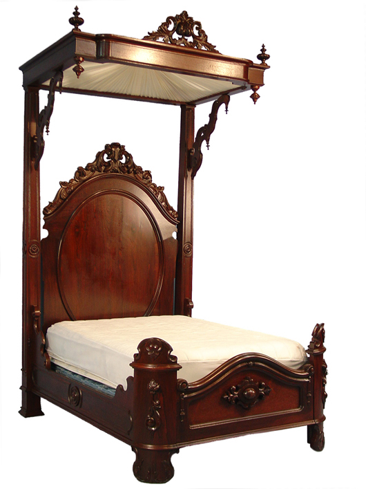 Rosewood half tester bed attributed to Mitchell & Rammelsberg in like-new condition. Price realized: $12,650. Stevens Auction Co. image.