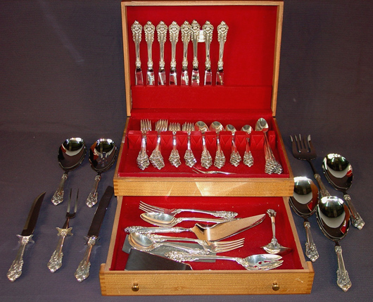 Sterling flatware service for eight, 67 pieces, in the Grand Baroque pattern by Wallace. Price realized: $4,370. Stevens Auction Co. image.