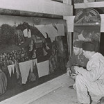 Lt. Daniel J. Kern and German conservator Karl Sieber examining Jan van Eyck’s 'Adoration of the Mystic Lamb,' also known as the Ghent Altarpiece (1432). Thomas Carr Howe papers, Archives of American Art, Smithsonian Institution. Photo courtesy of Archives of American Art, Smithsonian Institution.