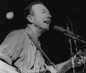 Pete Seeger playing banjo, March 13, 1960 at Pickard Theatre, Bowdoin College in Brunswick, Maine. Photo: © 2011, Diana Davies, courtesy Smithsonian Folkways. Photo used by permission.