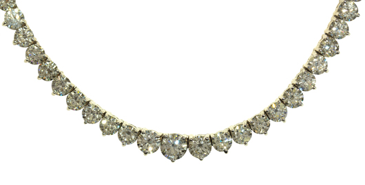 This 14K white gold Riviera necklace is dripping in diamonds weighing approximately 29.35 carats. This piece is expected to achieve $30,000-$50,000. Clars Auction Gallery image.