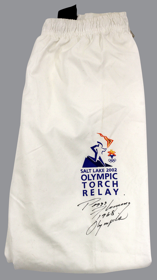 Official 1964 United States Olympic Team suitcase, autographed by Fleming. Clars Auction Gallery image.