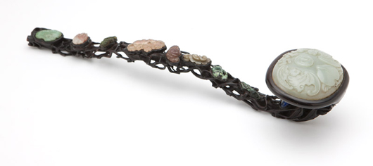 Asian works of art in Moran’s sale include this carved hardwood and colored stone-inset ruyi scepter (estimate: $3,000-$5,000). John Moran Auctioneers image.