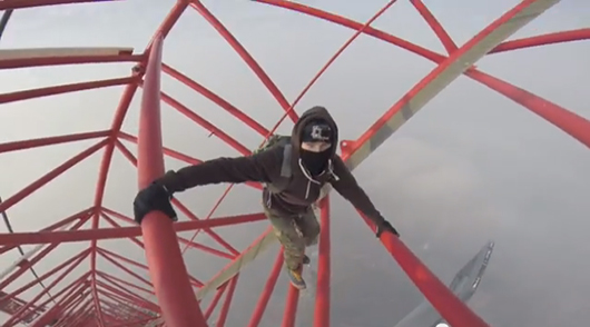 One of the Russian daredevils ascending the Shanghai Tower, as seen in a video taken by a fellow climber.