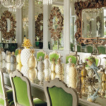 The formal dining room at the chateâu, including: a set of 20 Louis XV-style silver-painted dining chairs covered in green mohair Lelievre velvet (estimate: £8,000- £12,000) and a collection of 21 pineapple ornaments, late 20th century (estimate: £800-£1,200). © Christie’s Images Limited 2014.