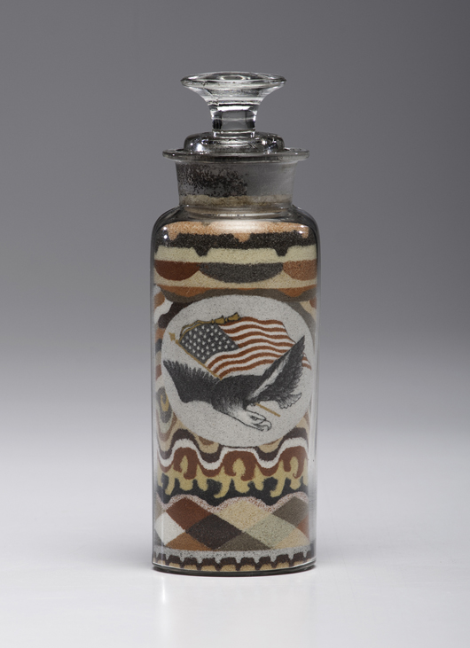 One of the top items in the auction was this Andrew Clemens sand bottle that sold for $19,800. Cowan's Auctions Inc. image.