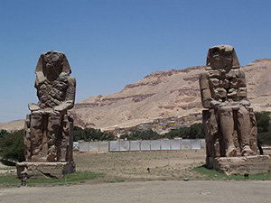 Pharaoh Amenhotep III's Colossi of Memnon statues at Luxor, Egypt. Image by Than217 at en.wikipedia, This file is licensed under the Creative Commons Attribution 3.0 Unported license.