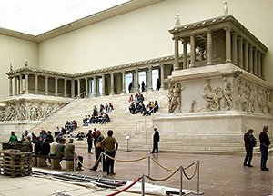 The reconstructed Pergamon Altar at Pergamon Museum in Berlin. Image by Raimond Spekking / CC-BY-SA-3.0 (via Wikimedia Commons). This file is licensed under the Creative Commons Attribution-Share Alike 3.0 Unported license.