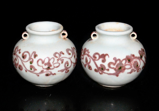 Yuan Dynasty bird feeder jars with copper overglaze, representative of the evolution in porcelain during this period. Lot 215. Estimate: $2,000-$3,000. Gianguan Auctions image.