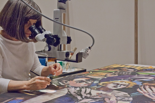 Joan Gorman of the Midwest Art Conservation Center working on the Max Beckmann painting. Photo: Minneapolis Institute of Arts.