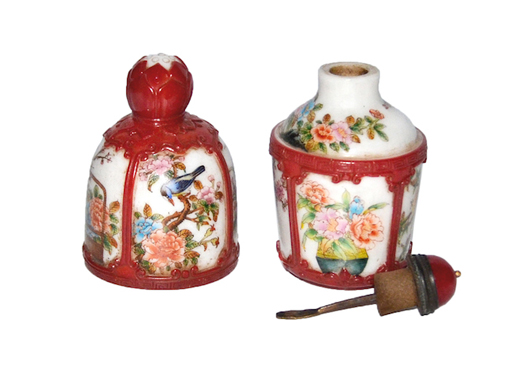 From an extensive collection of snuff bottles, a Qianlong period Famille Rose snuff bottle with red glass overlay creating windows of bird and floral decoration, with four-character Qianlong mark. Estimate: $2,000-$4,000. Gianguan Auctions image. 